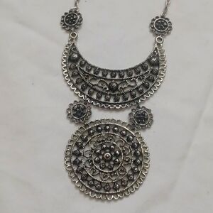 Necklace, vintage silver toned,sits at most color bones